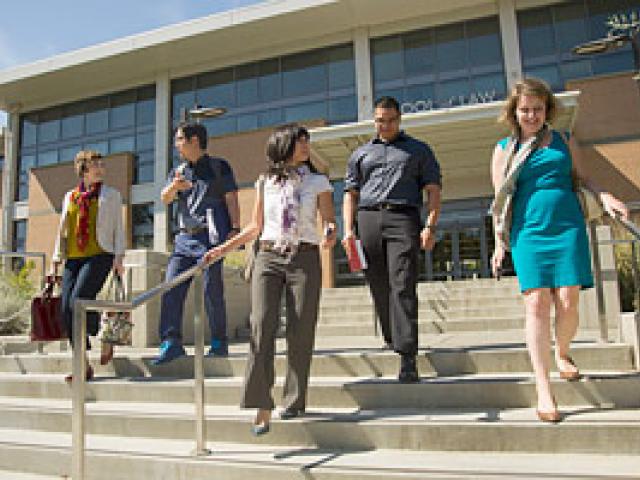 students walking outside UC Davis School of Law building