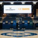 Photo of scoreboard displaying UCU and UC Davis.